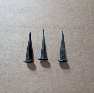Decorative iron nail spikes